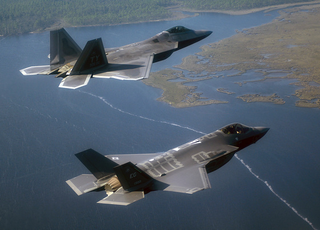 Illustration for article titled Why It's Sad That The F-22 Just Fired Its First Guided AIM-9X Sidewinder